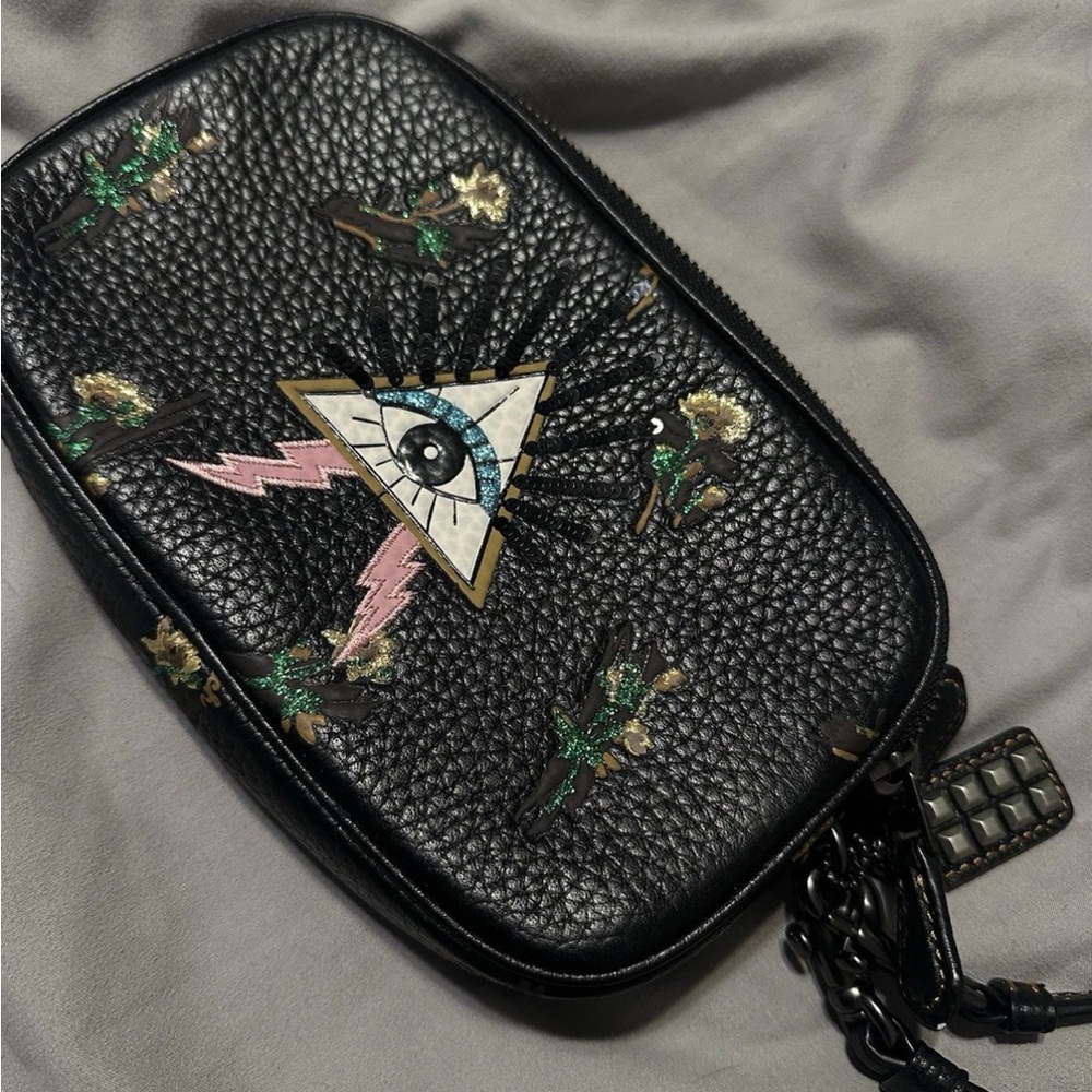 Coach eye pyramid bag